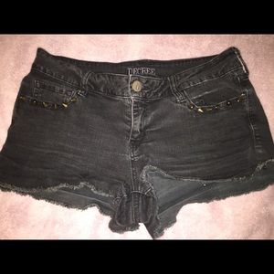 Black short shorts w studs on the pockets